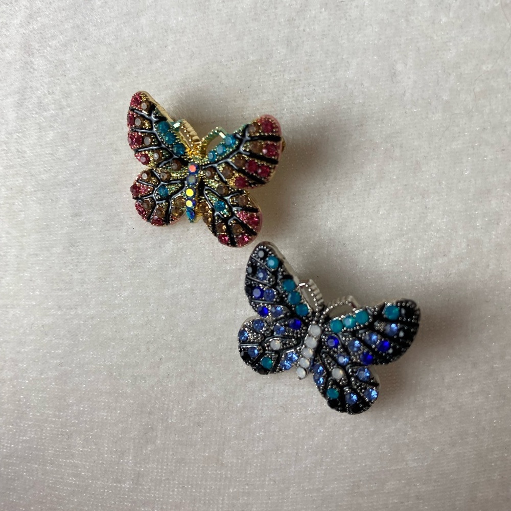Butterfly brooches.